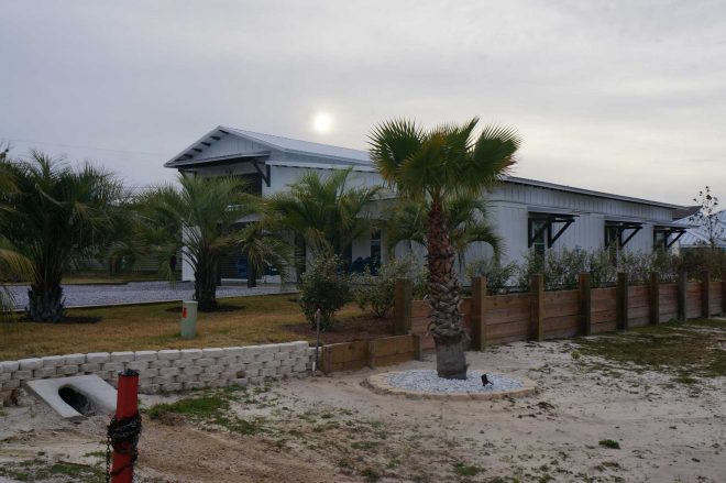 New home with boat storage - side yard view.