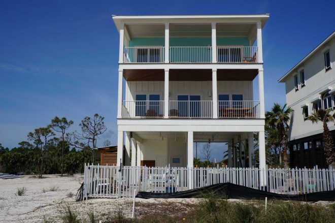 Exterior view of three story home nearing completion by our Mexico Beach FL home builders.