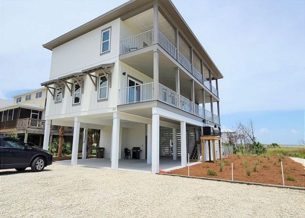 Angle view of the three story new home on stilts we built in Port St Joe/Mexico beach area.