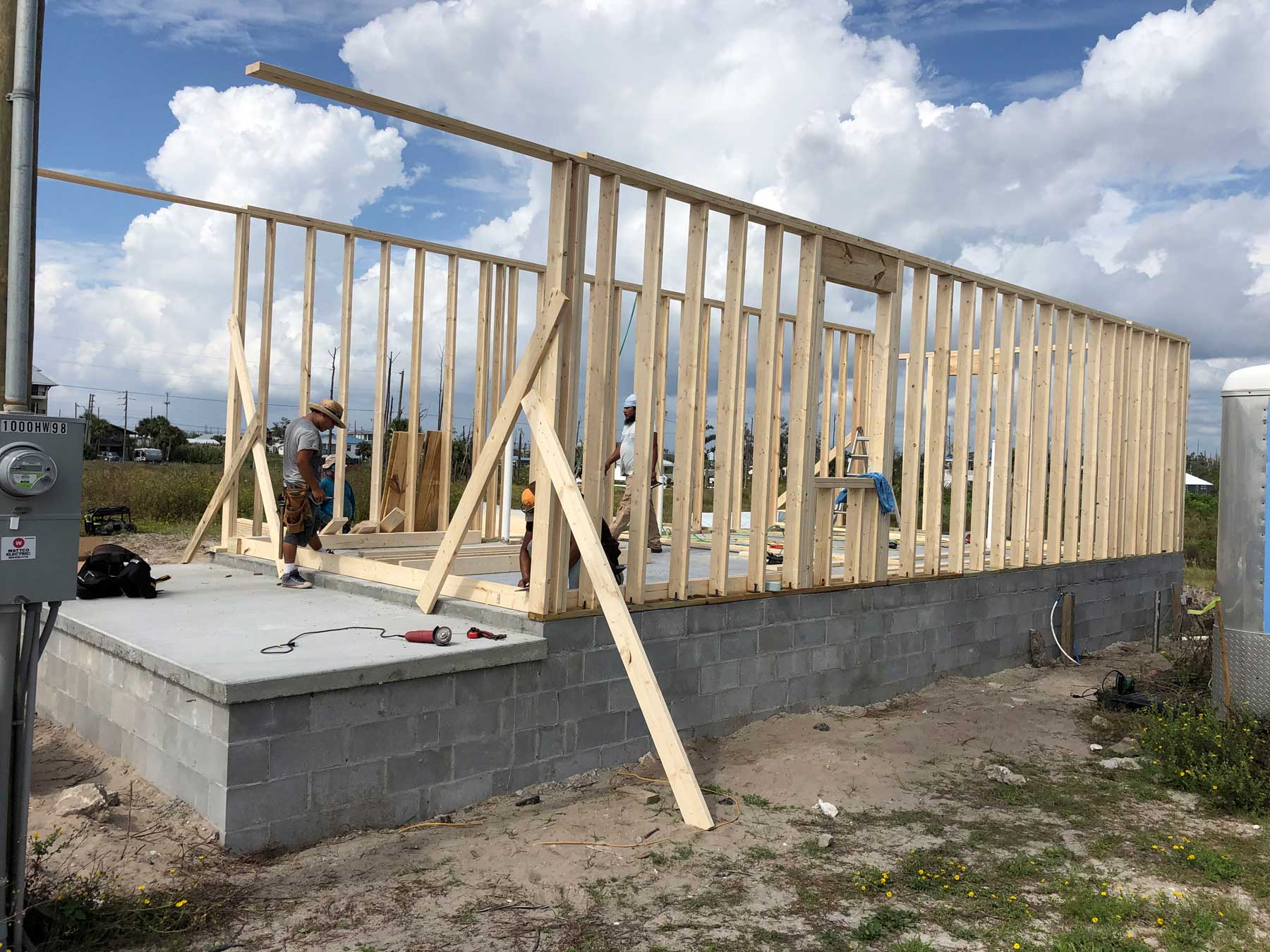 Wall frames sitting on the new foundation.