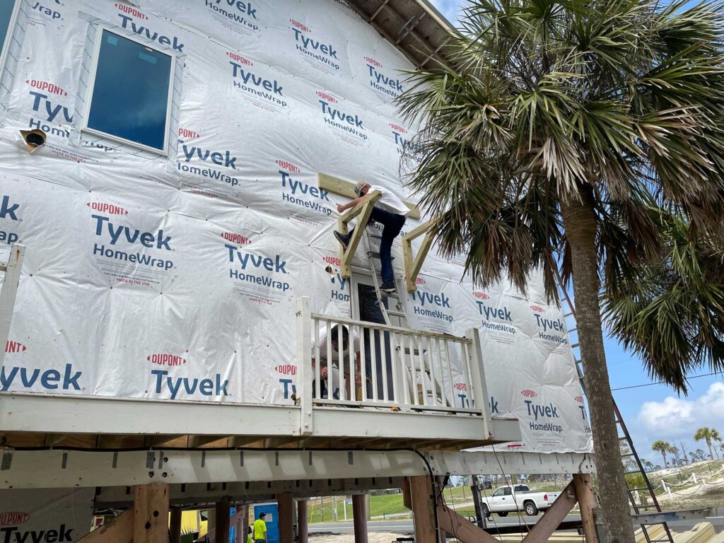 Replacing siding and windows.